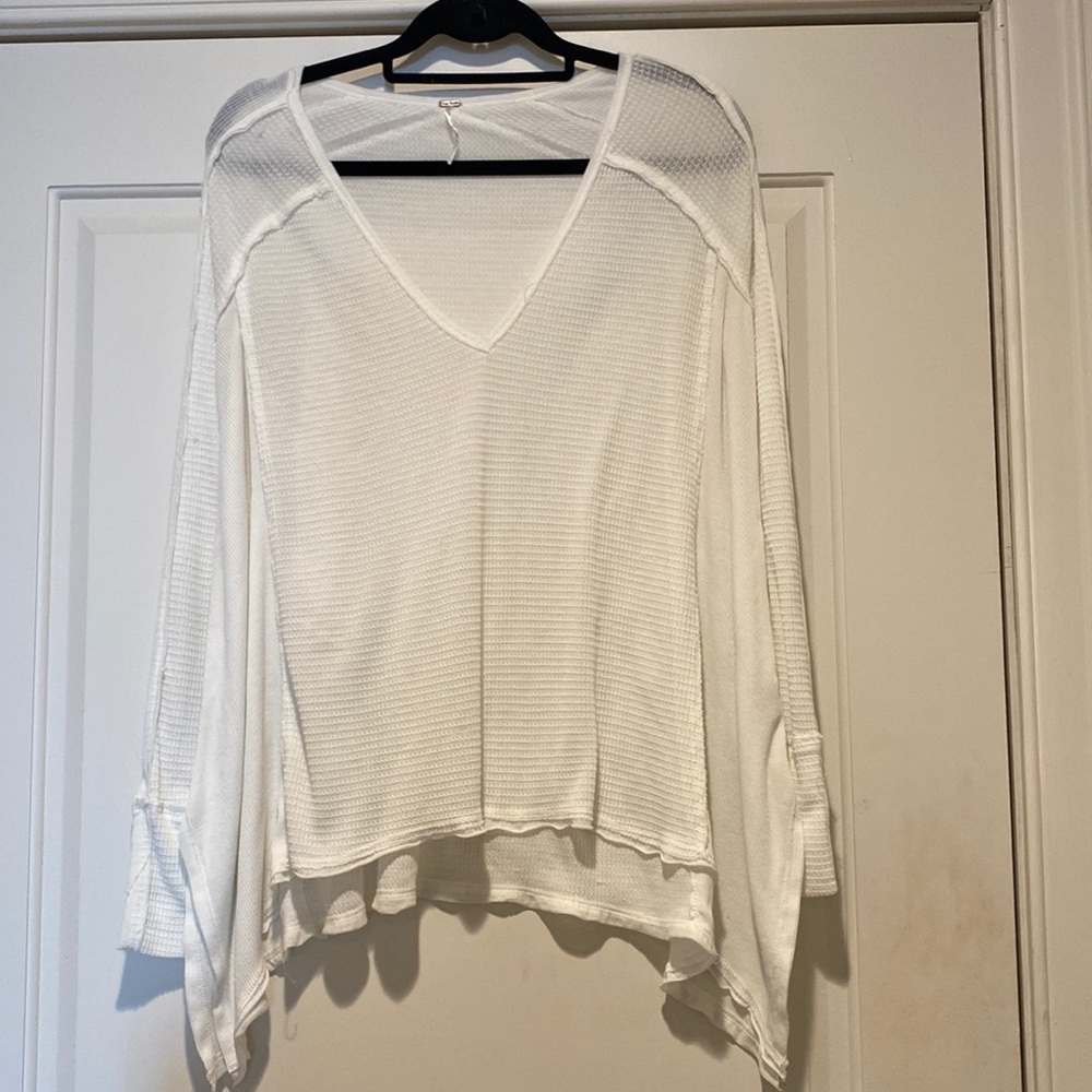 Free People. White top. Size extra small/small.